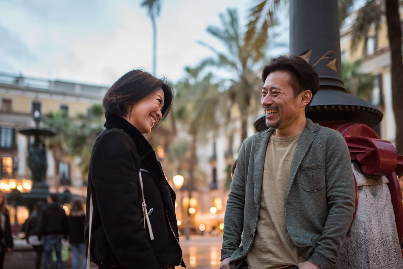 Happy couple using FlexyRemit
